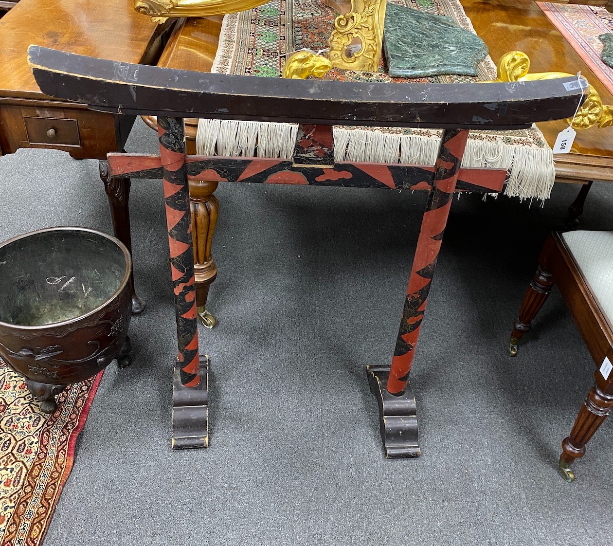 A Japanese lacquer robe stand, 19th century, width 99cm, depth 30cm, height 96cm